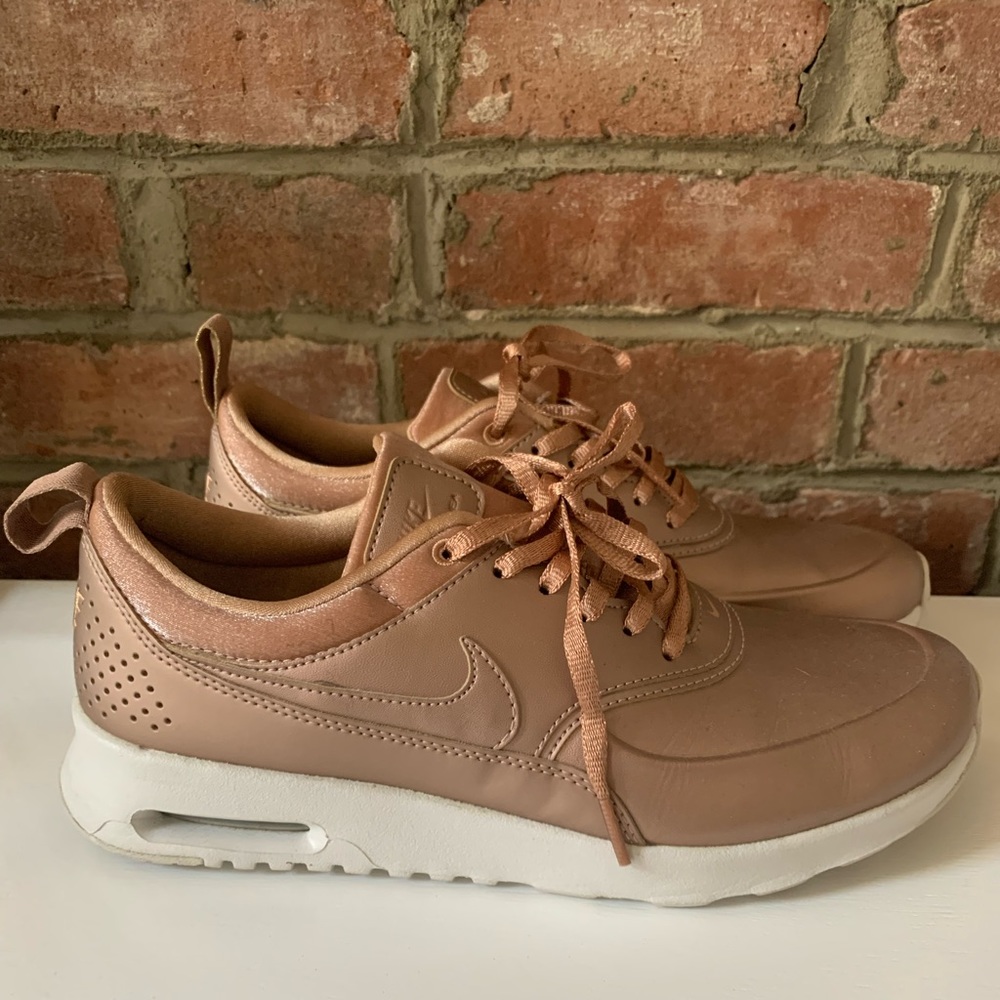 Rose gold Nikes